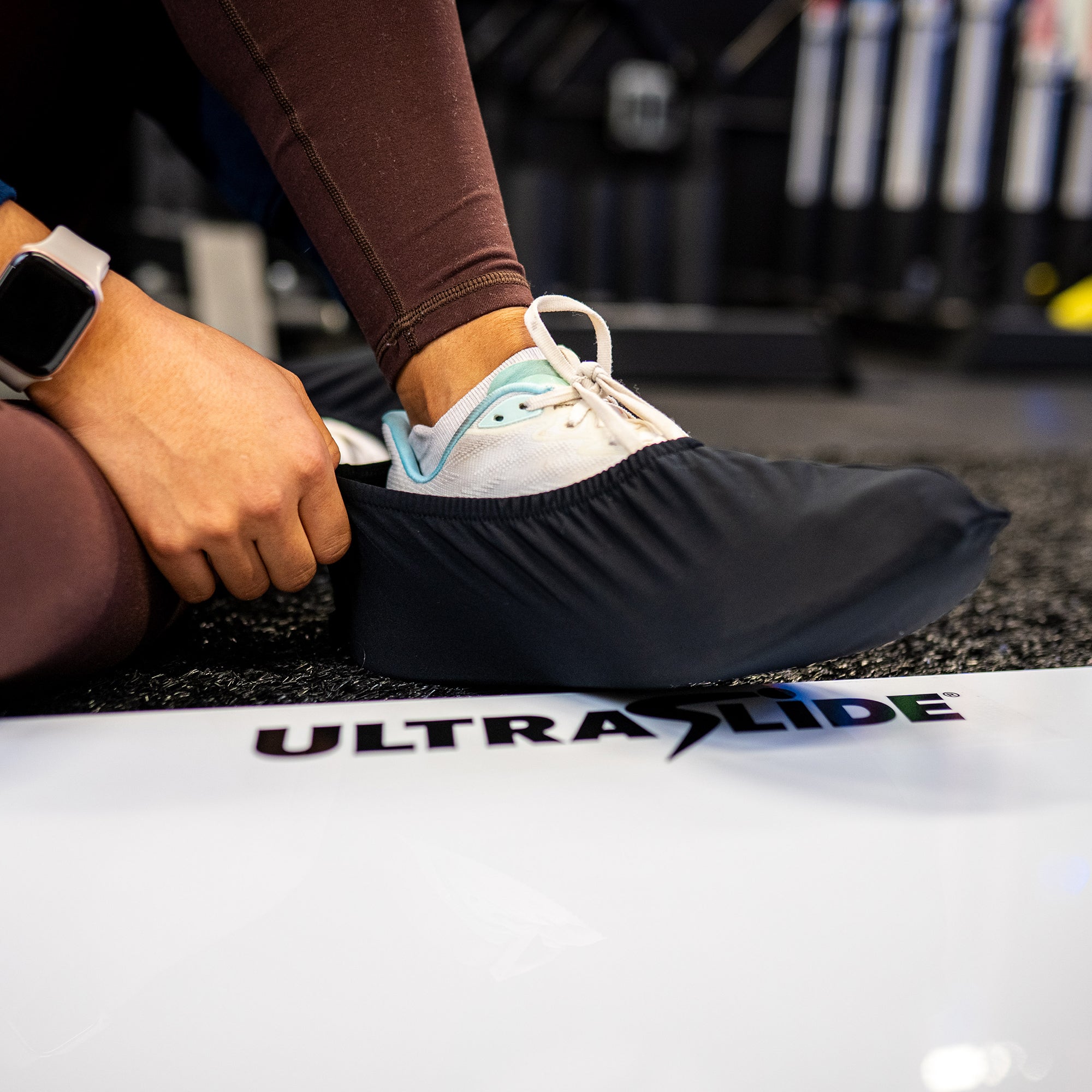 An UltraSlide Slide Slipper being pulled onto a shoe